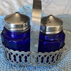 COBALT BLUE GLASS salt & pepper shakers, metal holder w/handle.  $15